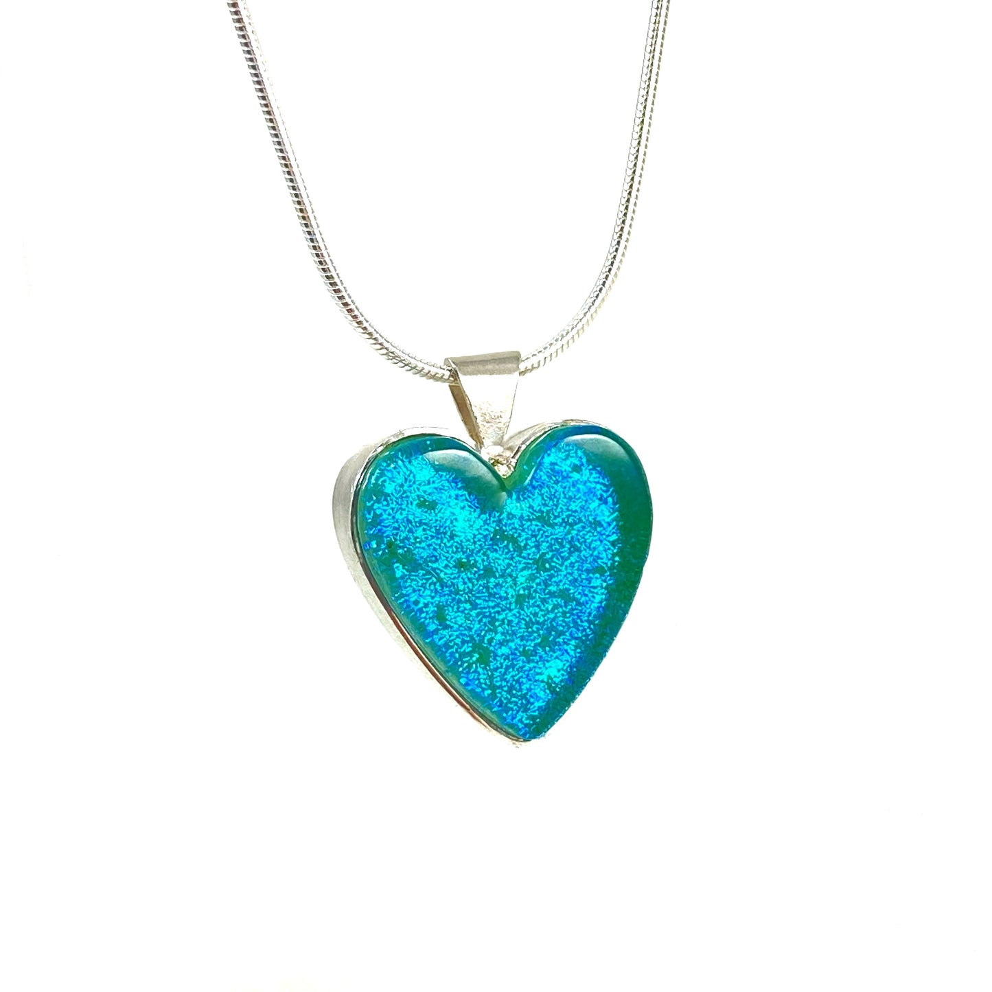 Soft sparkly aqua blue glass heart necklace, fused glass, glass jewelry, glass and silver jewelry, handmade, handcrafted, American Craft, hand fabricated jewelry, hand fabricated jewellery, Athens, Georgia, colorful jewelry, sparkle, bullseye glass, dichroic glass, art jewelry