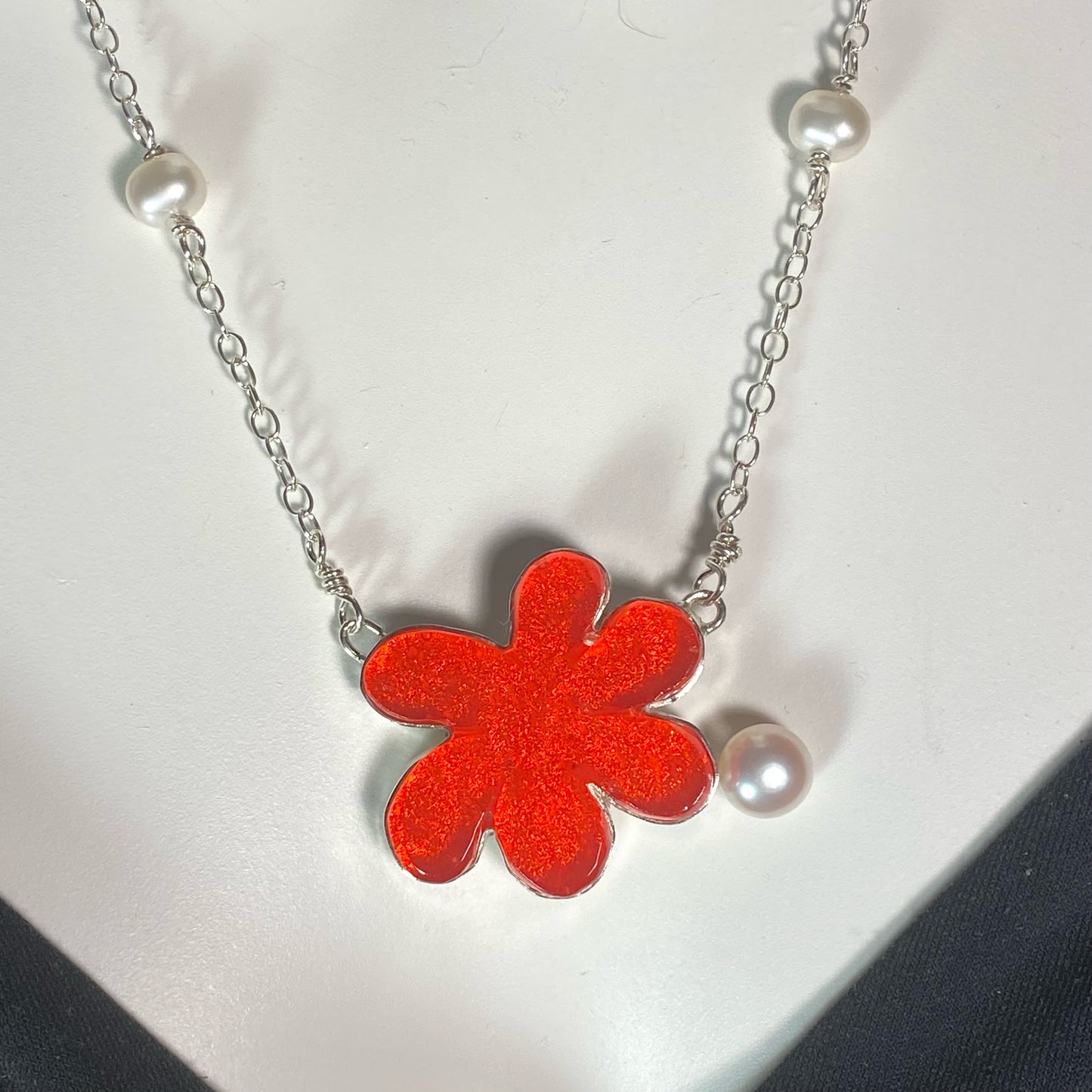 Orange flower necklace with pearls, fused glass, glass jewelry, glass and silver jewelry, handmade, handcrafted, American Craft, hand fabricated jewelry, hand fabricated jewellery, Athen, Georgia, colorful jewelry, sparkle, bullseye glass, dichroic glass, art jewelry