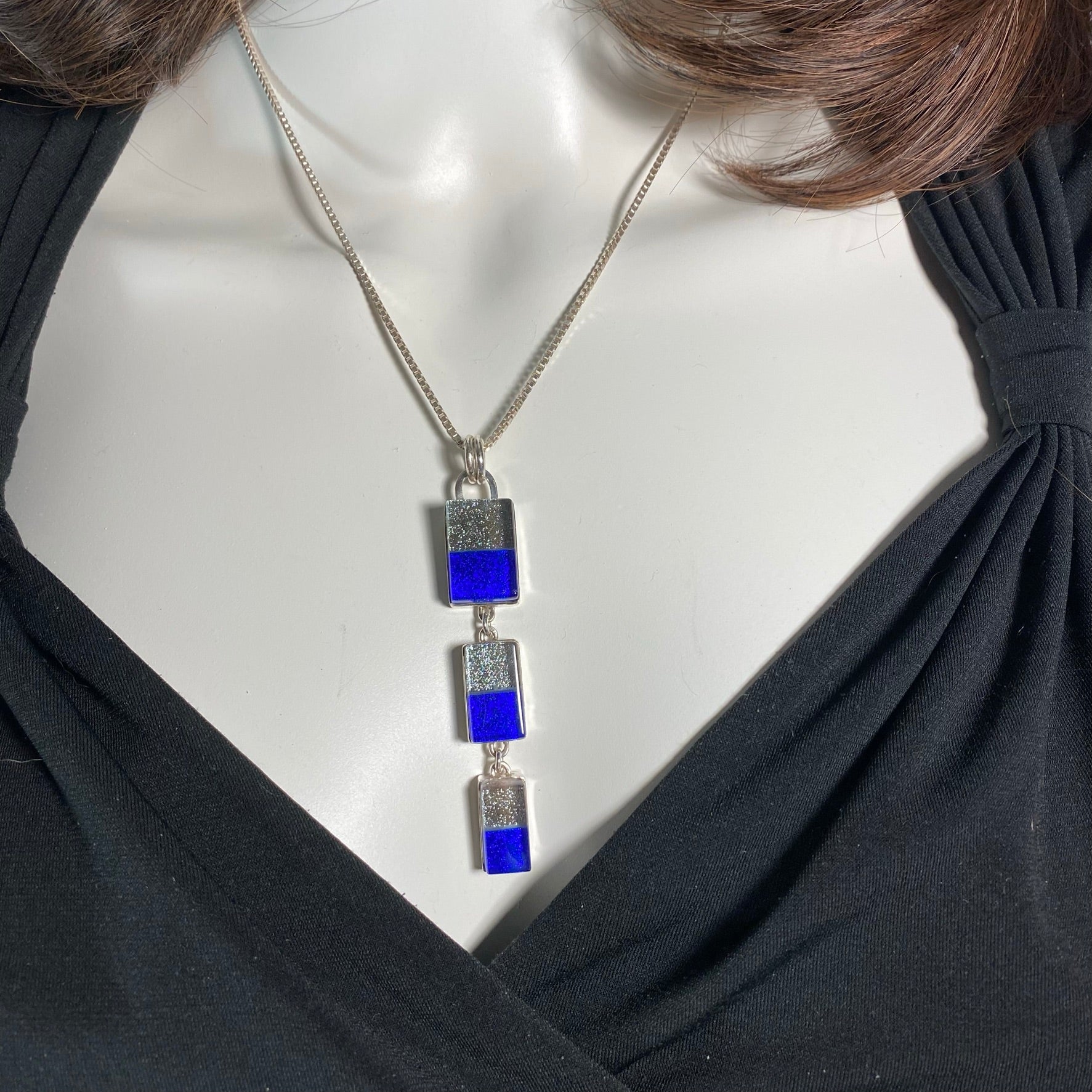 Triple drop rectangle necklace in platinum gray and cobalt blue glass, fused glass, glass jewelry, glass and silver jewelry, handmade, handcrafted, American Craft, hand fabricated jewelry, hand fabricated jewellery, Athen, Georgia, colorful jewelry, sparkle, bullseye glass, dichroic glass, art jewelry