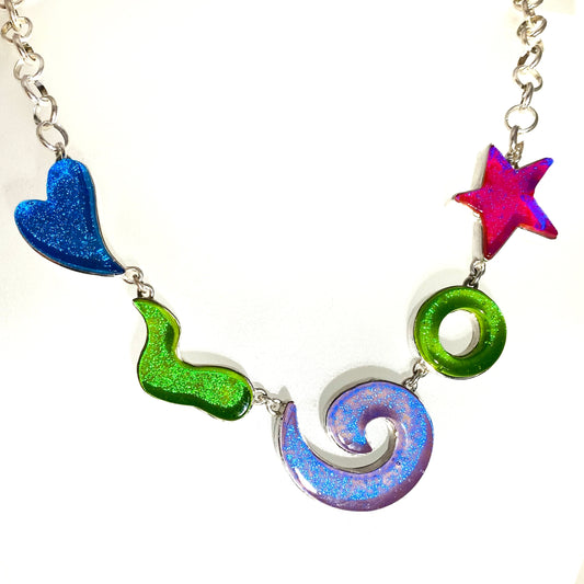 Statement necklace in turquoise, green, lavendar, and pink glass in sterling silver, fused glass, glass jewelry, glass and silver jewelry, handmade, handcrafted, American Craft, hand fabricated jewelry, hand fabricated jewellery, Athen, Georgia, colorful jewelry, sparkle, bullseye glass, dichroic glass, art jewelry