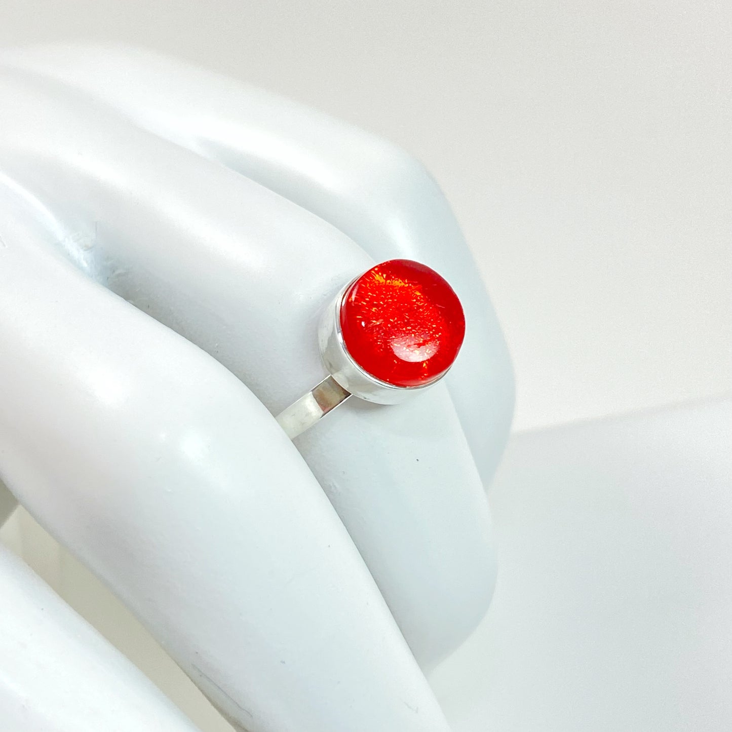 orange glass circle ring, fused glass, glass jewelry, glass and silver jewelry, handmade, handcrafted, American Craft, hand fabricated jewelry, hand fabricated jewellery, Athen, Georgia, colorful jewelry, sparkle, bullseye glass, dichroic glass, art jewelry