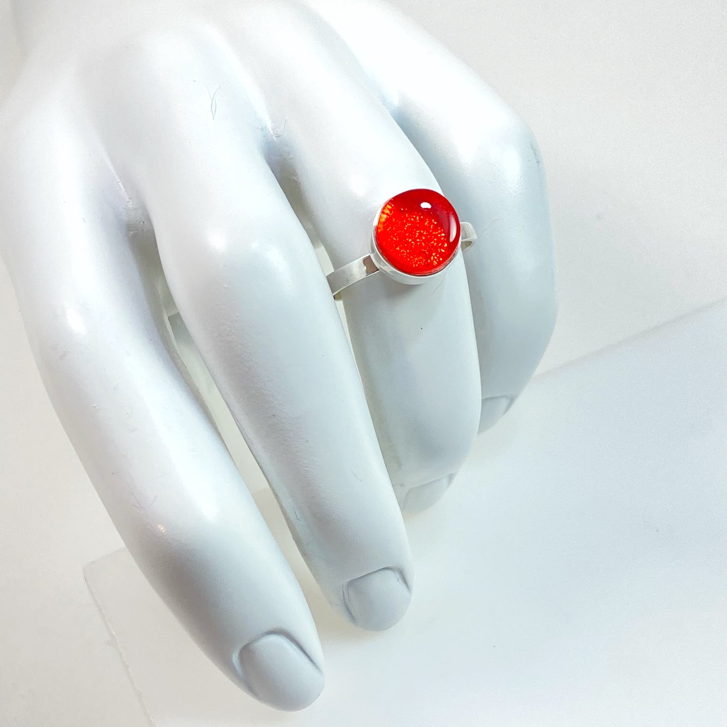 orange glass circle ring, fused glass, glass jewelry, glass and silver jewelry, handmade, handcrafted, American Craft, hand fabricated jewelry, hand fabricated jewellery, Athen, Georgia, colorful jewelry, sparkle, bullseye glass, dichroic glass, art jewelry