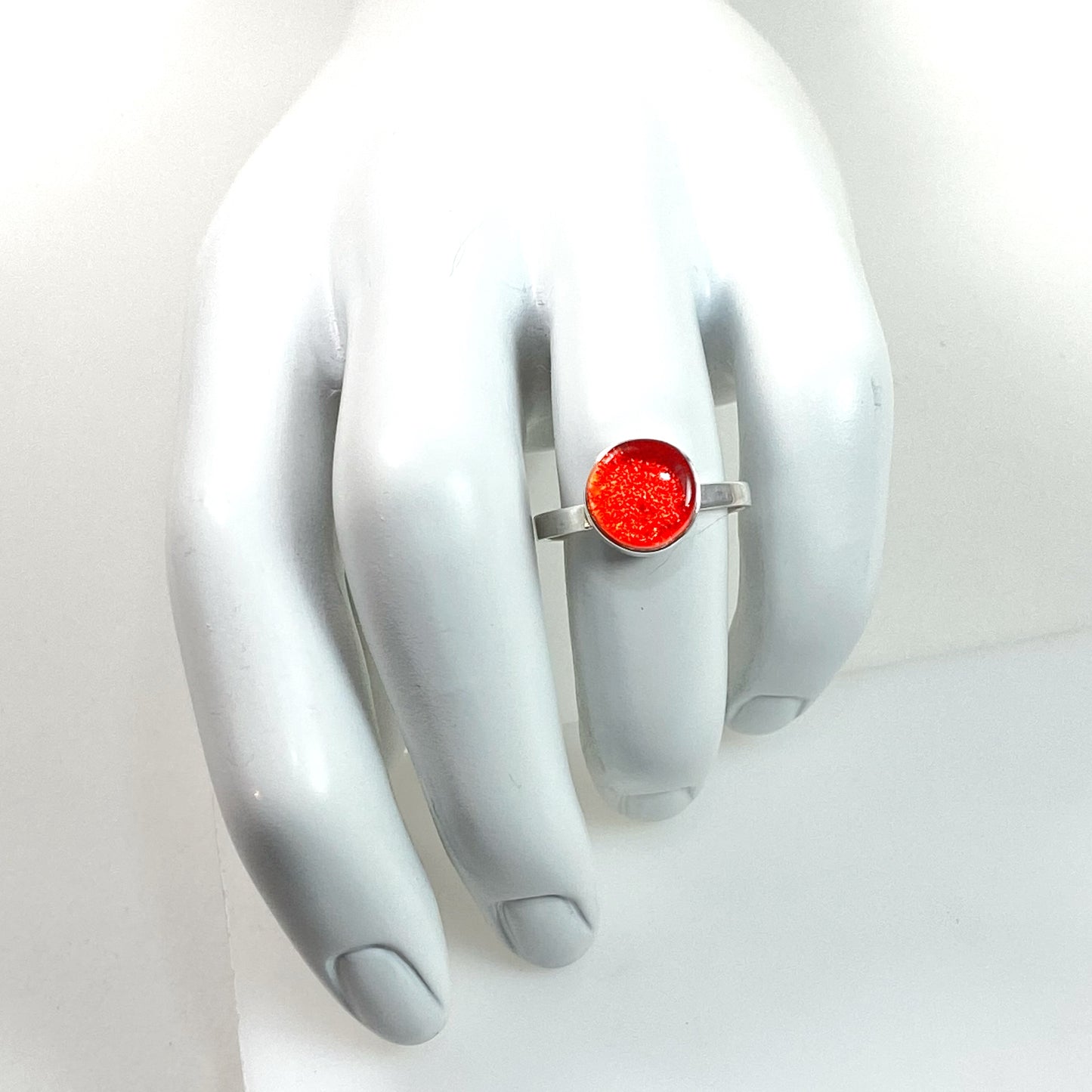 orange glass circle ring, fused glass, glass jewelry, glass and silver jewelry, handmade, handcrafted, American Craft, hand fabricated jewelry, hand fabricated jewellery, Athen, Georgia, colorful jewelry, sparkle, bullseye glass, dichroic glass, art jewelry