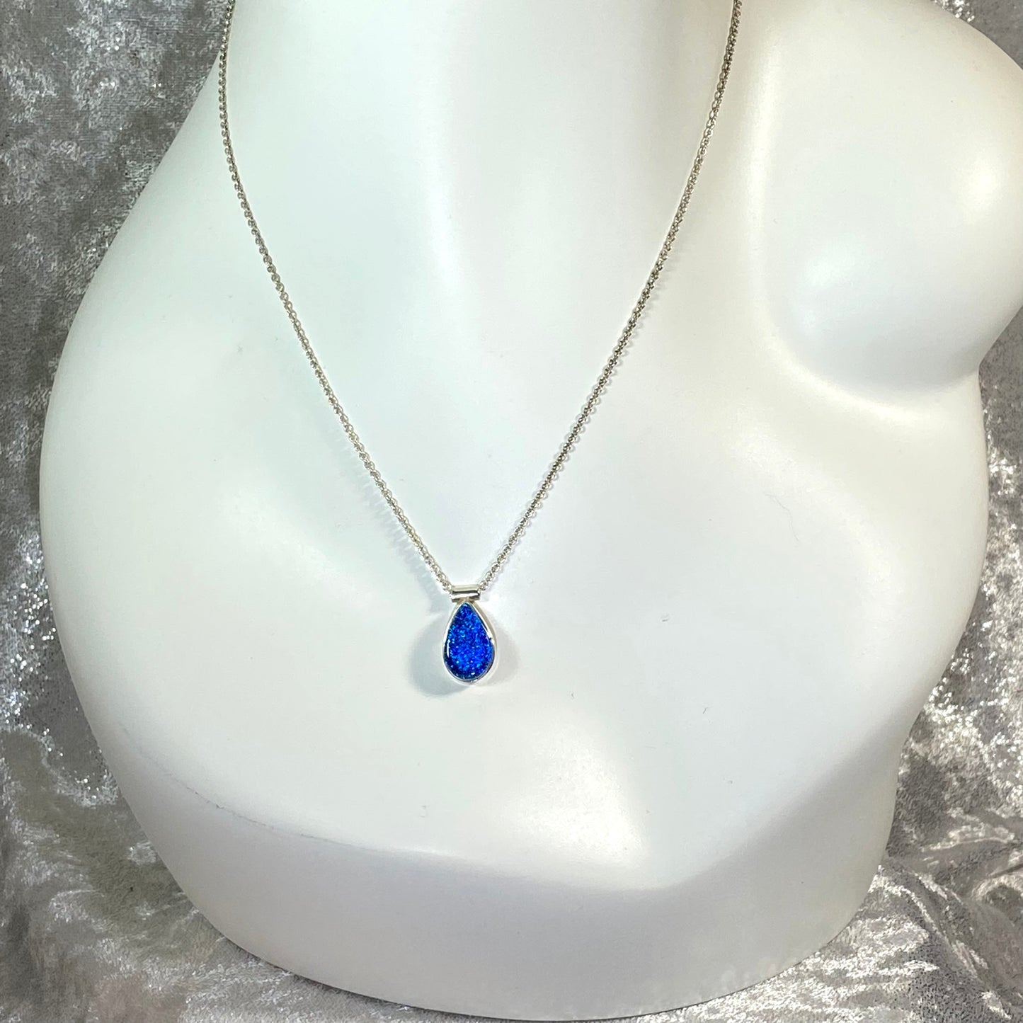 Teardrop peacock blue glass small necklace, sterling silver cable chain, glass jewelry, glass and silver jewelry, handmade, handcrafted, American Craft, hand fabricated jewelry, hand fabricated jewellery, Athen, Georgia, colorful jewelry, sparkle, bullseye glass, dichroic glass, art jewelry
