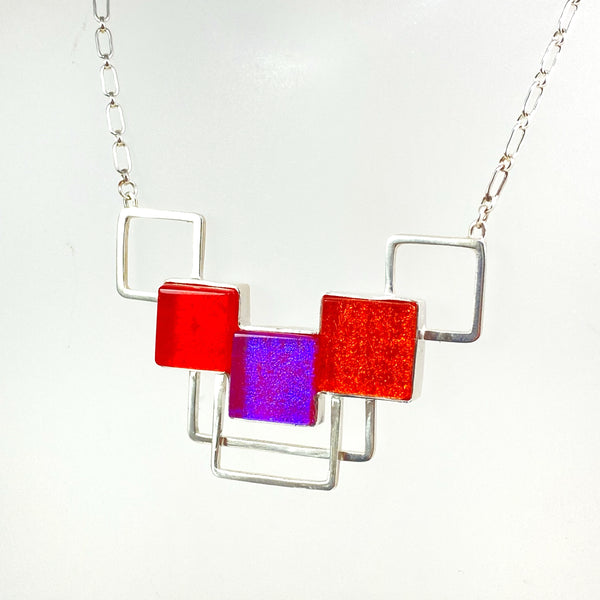 mid century modern, square necklace with silver square frames,, three elements, pink and orange, fused glass, glass jewelry, glass and silver jewelry, handmade, handcrafted, American Craft, hand fabricated jewelry, hand fabricated jewellery, Athen, Georgia, colorful jewelry, sparkle, bullseye glass, dichroic glass, art jewelry