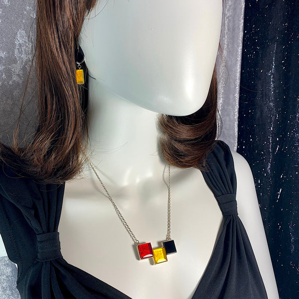 modern art inspired 3 element necklace, white, red, yellow, fused glass, glass jewelry, glass and silver jewelry, handmade, handcrafted, American Craft, hand fabricated jewelry, hand fabricated jewellery, Athen, Georgia, colorful jewelry, sparkle, bullseye glass, dichroic glass, art jewelry