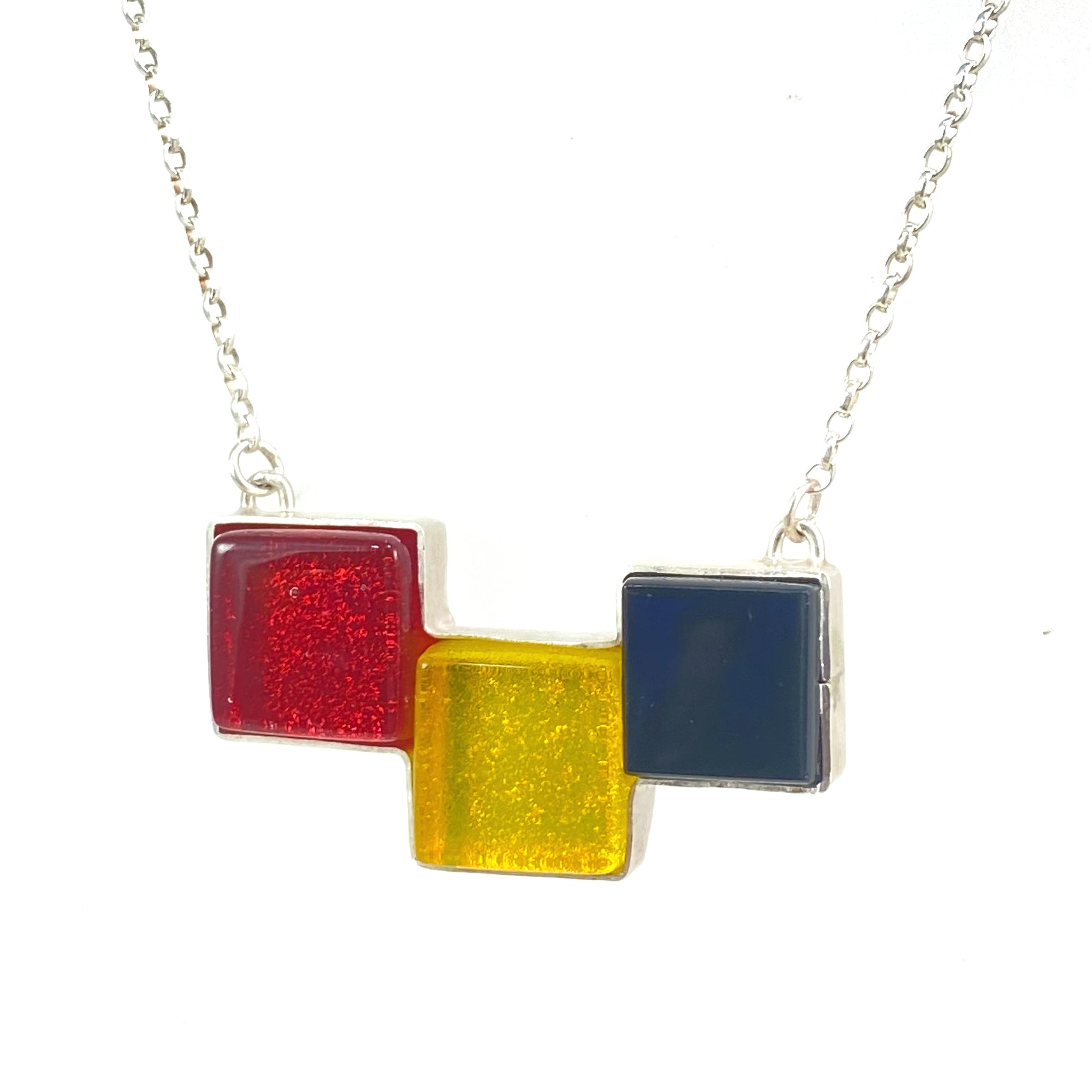 modern art inspired 3 element necklace, white, red, yellow, fused glass, glass jewelry, glass and silver jewelry, handmade, handcrafted, American Craft, hand fabricated jewelry, hand fabricated jewellery, Athen, Georgia, colorful jewelry, sparkle, bullseye glass, dichroic glass, art jewelry