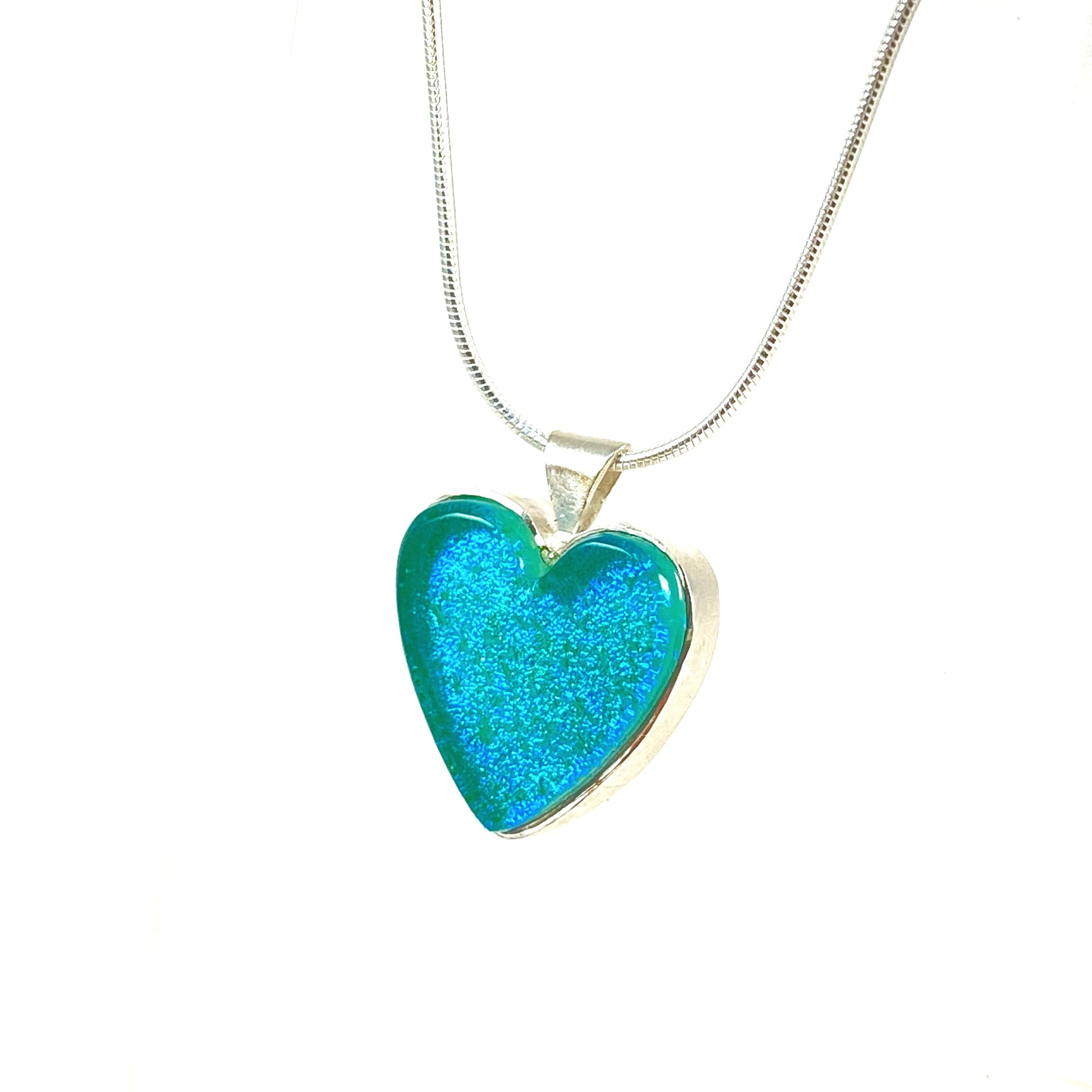 Soft sparkly aqua blue glass heart necklace, fused glass, glass jewelry, glass and silver jewelry, handmade, handcrafted, American Craft, hand fabricated jewelry, hand fabricated jewellery, Athens, Georgia, colorful jewelry, sparkle, bullseye glass, dichroic glass, art jewelry
