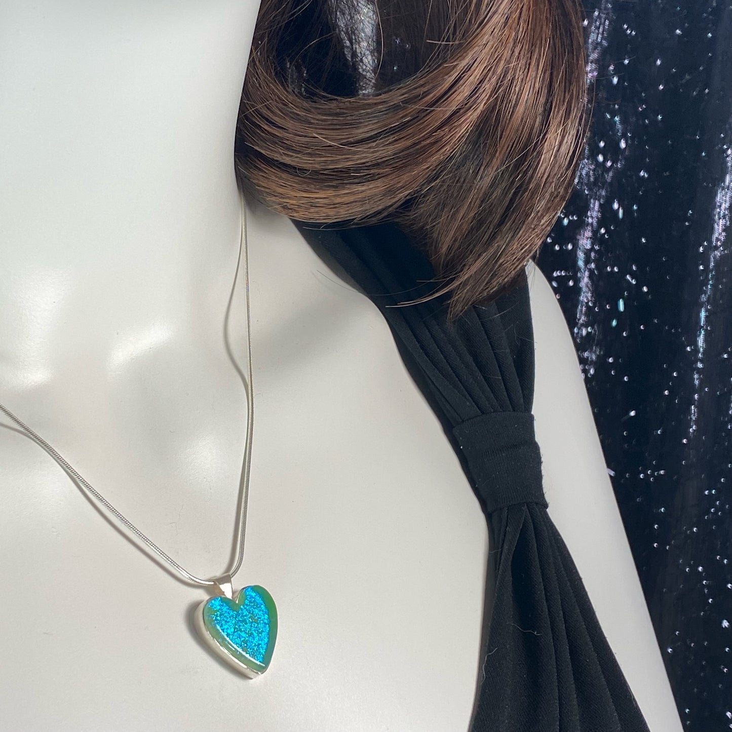 Soft sparkly aqua blue glass heart necklace, fused glass, glass jewelry, glass and silver jewelry, handmade, handcrafted, American Craft, hand fabricated jewelry, hand fabricated jewellery, Athens, Georgia, colorful jewelry, sparkle, bullseye glass, dichroic glass, art jewelry