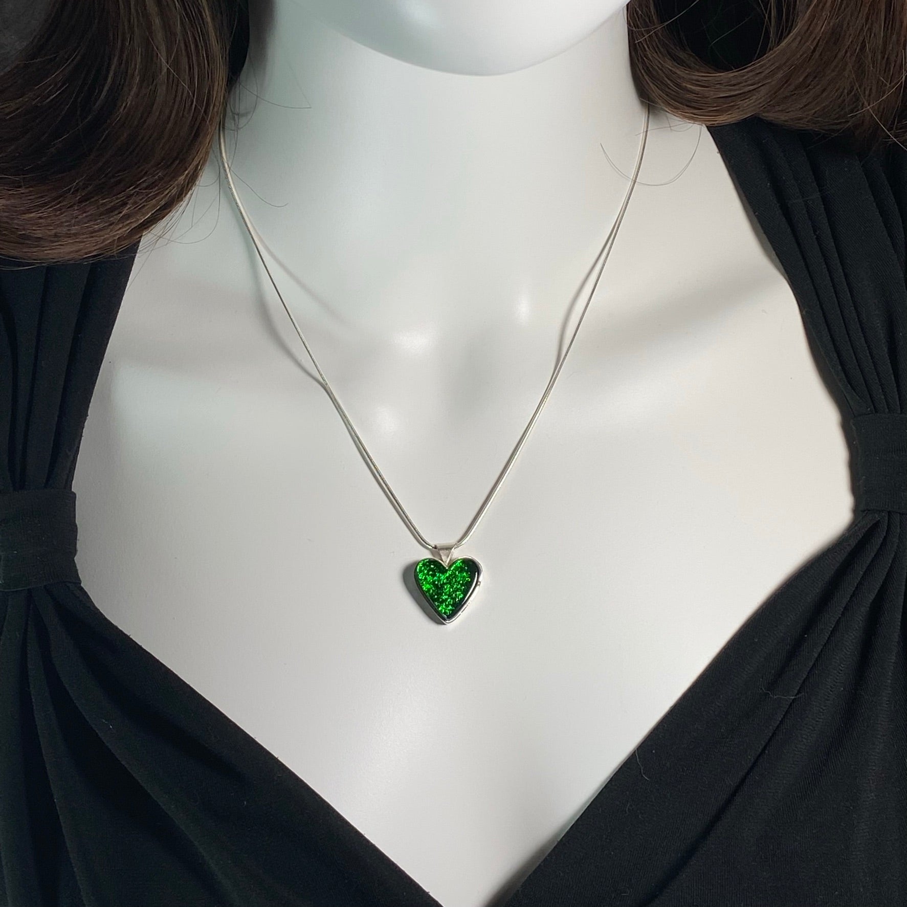 Bright emerald green heart necklace, fused glass, glass jewelry, glass and silver jewelry, handmade, handcrafted, American Craft, hand fabricated jewelry, hand fabricated jewellery, Athens, Georgia, colorful jewelry, sparkle, bullseye glass, dichroic glass, art jewelry