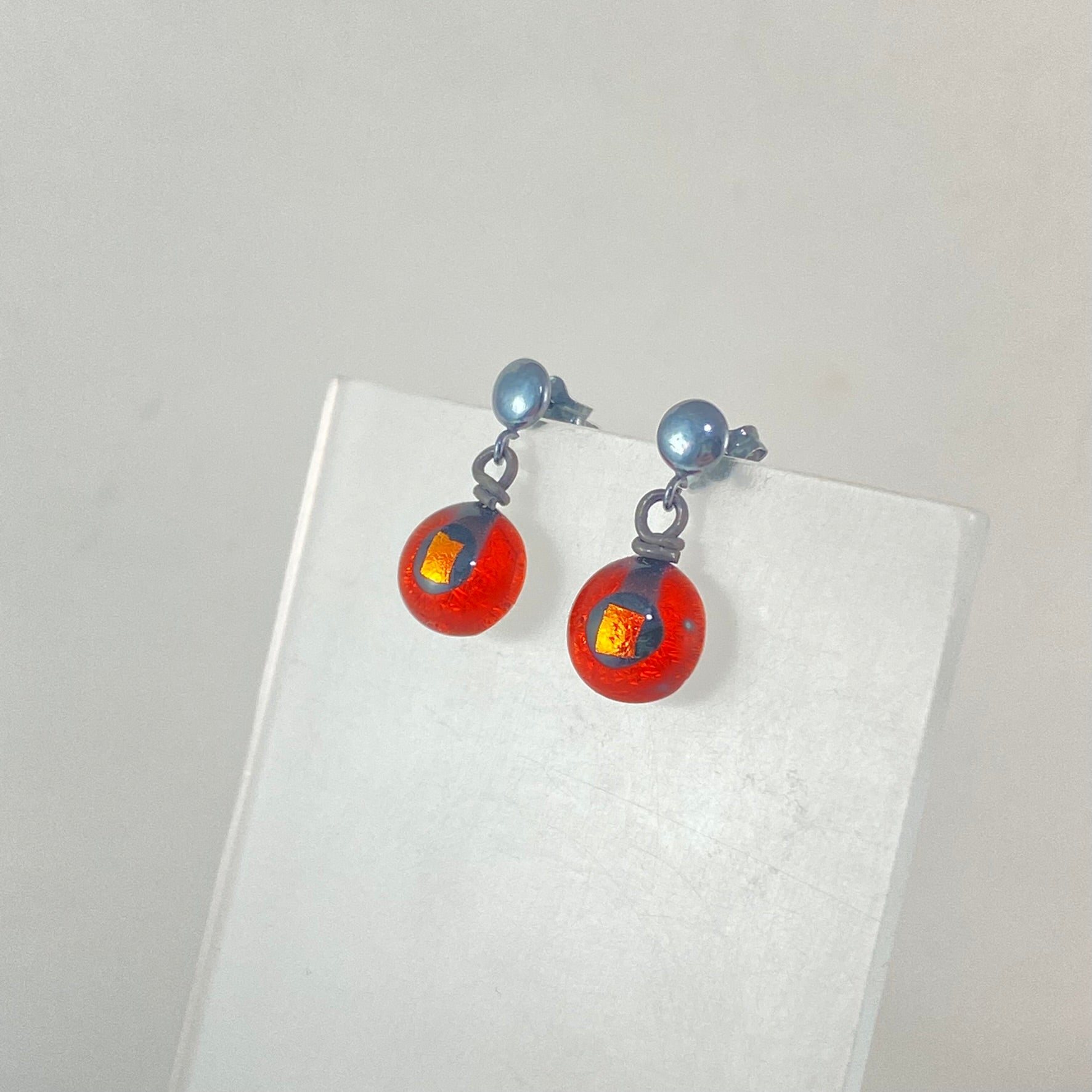 Oxidized Post Space Ball Earrings in Orange