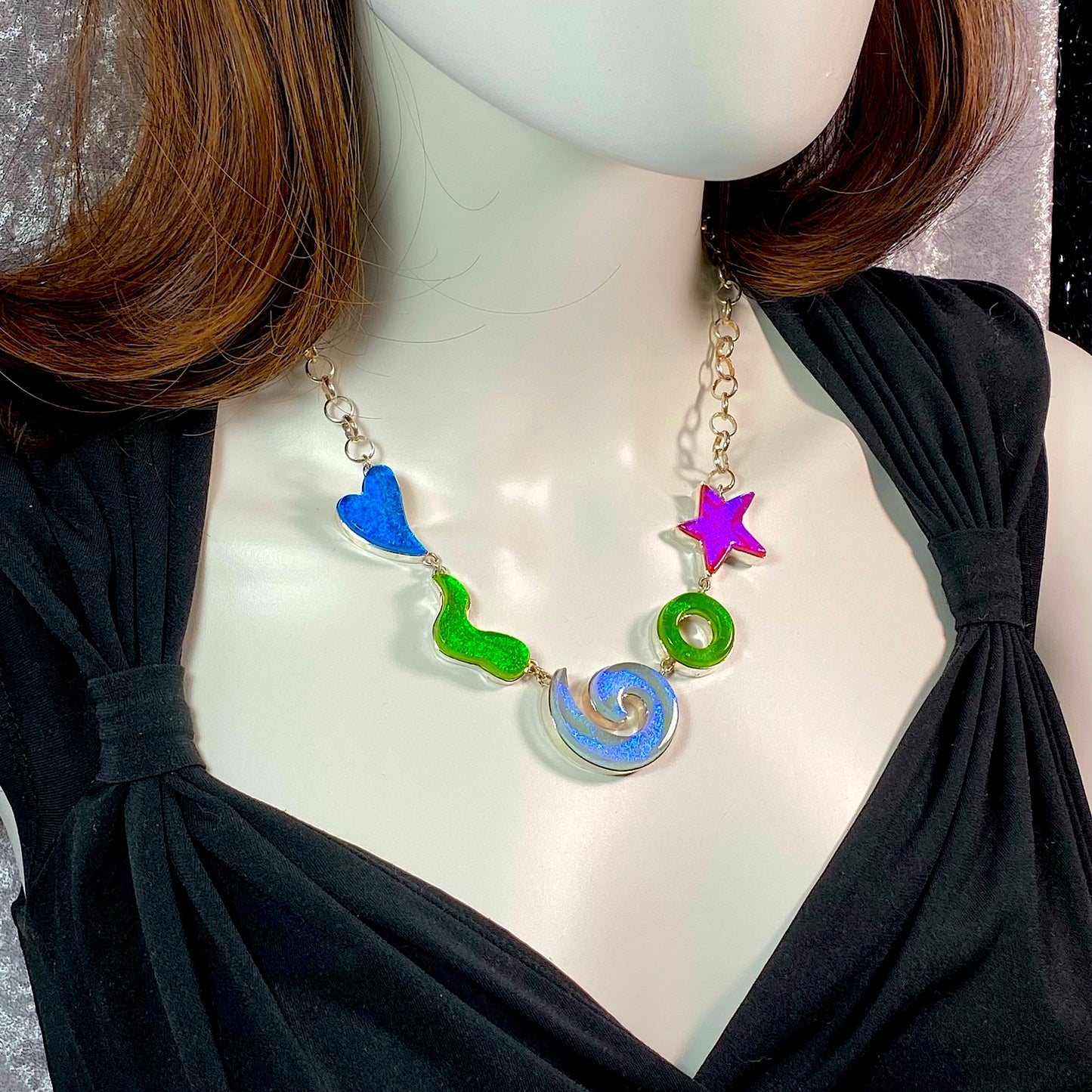Statement necklace in turquoise, green, lavendar, and pink glass in sterling silver, fused glass, glass jewelry, glass and silver jewelry, handmade, handcrafted, American Craft, hand fabricated jewelry, hand fabricated jewellery, Athen, Georgia, colorful jewelry, sparkle, bullseye glass, dichroic glass, art jewelry