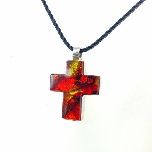 Sun melange mixture of red, gold and orange glass, ,fused glass  in a cross shape necklace, glass jewelry, glass and silver jewelry, handmade, handcrafted, American Craft, hand fabricated jewelry, hand fabricated jewellery, Athen, Georgia, colorful jewelry, sparkle, bullseye glass, dichroic glass, art jewelry