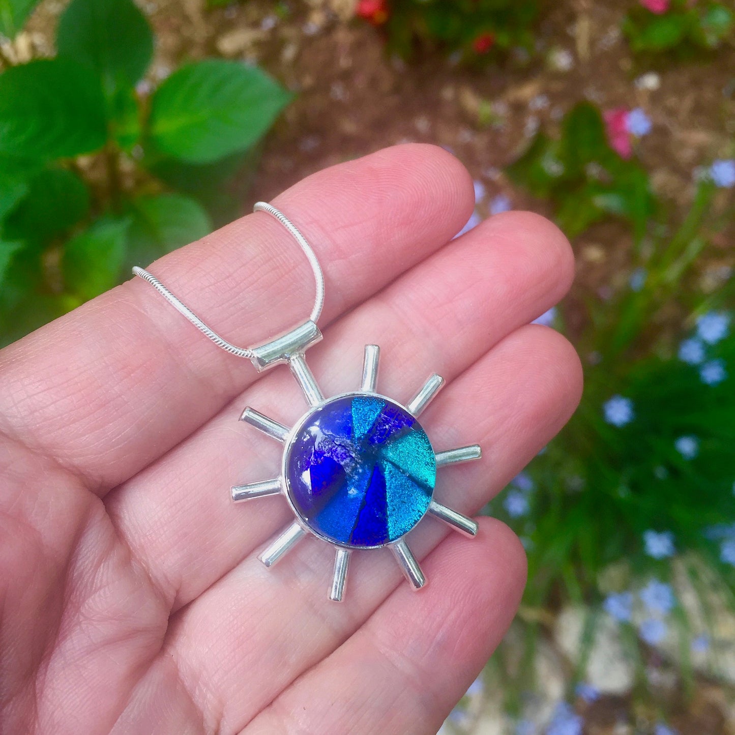 blue melange, blue, abstract corona pendant necklace, fused glass, glass jewelry, glass and silver jewelry, handmade, handcrafted, American Craft, hand fabricated jewelry, hand fabricated jewellery, Athen, Georgia, colorful jewelry, sparkle, bullseye glass, dichroic glass, art jewelry