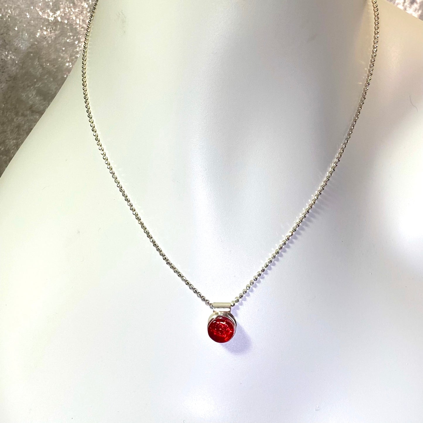 Circle cherry red small necklace, glass jewelry, glass and silver jewelry, handmade, handcrafted, American Craft, hand fabricated jewelry, hand fabricated jewellery, Athen, Georgia, colorful jewelry, sparkle, bullseye glass, dichroic glass, art jewelry