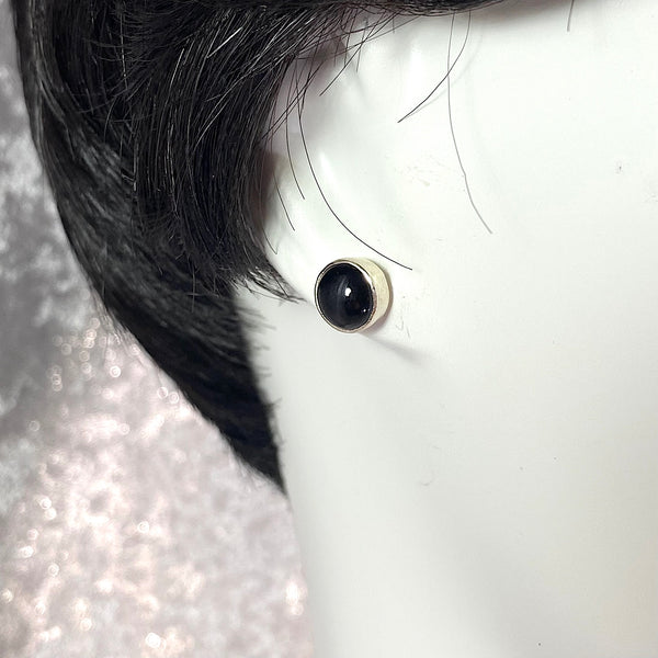 Circle post earrings in black glass, fused glass, glass jewelry, glass and silver jewelry, handmade, handcrafted, American Craft, hand fabricated jewelry, hand fabricated jewellery, Athen, Georgia, colorful jewelry, sparkle, bullseye glass, dichroic glass, art jewelry