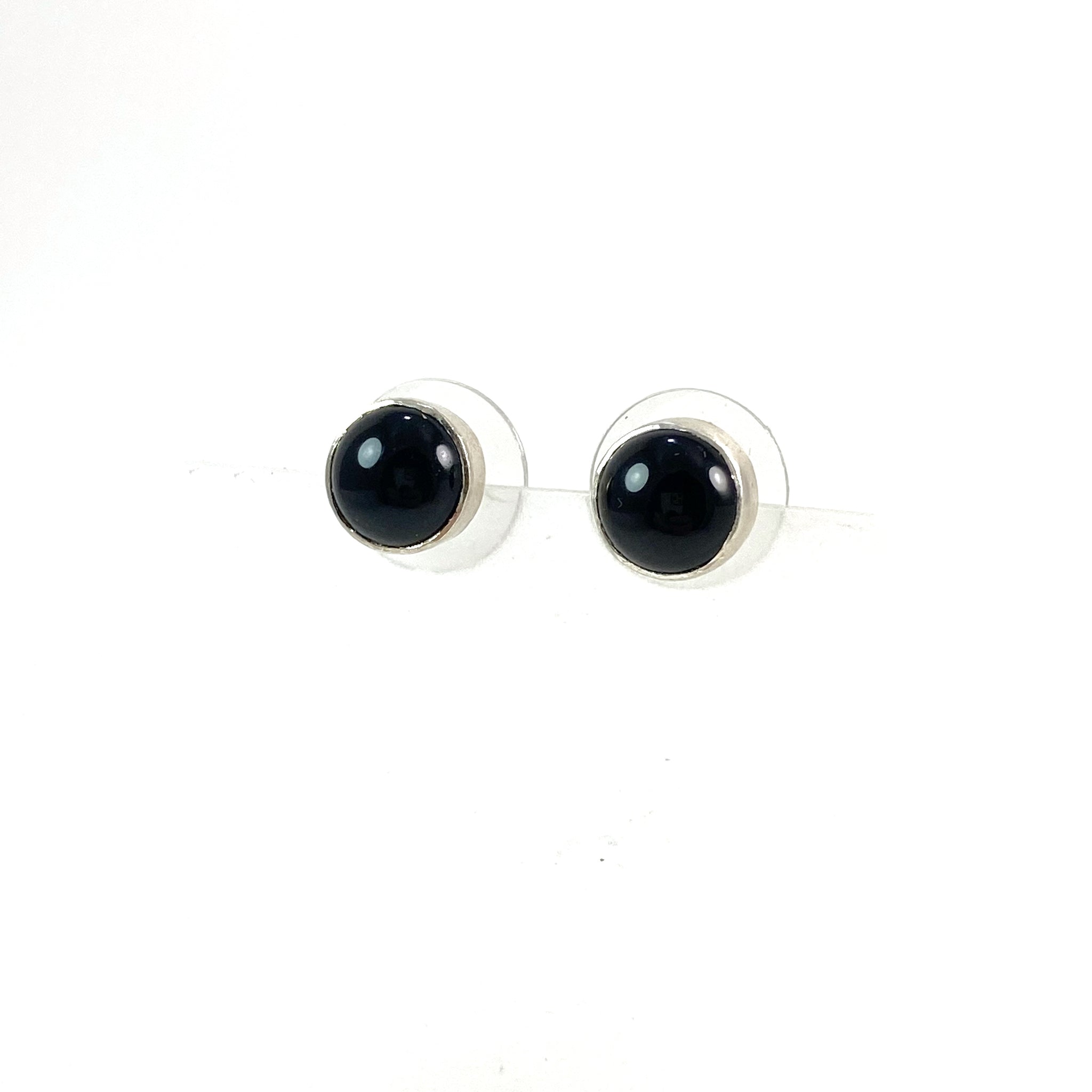 Circle post earrings in black glass, fused glass, glass jewelry, glass and silver jewelry, handmade, handcrafted, American Craft, hand fabricated jewelry, hand fabricated jewellery, Athen, Georgia, colorful jewelry, sparkle, bullseye glass, dichroic glass, art jewelry