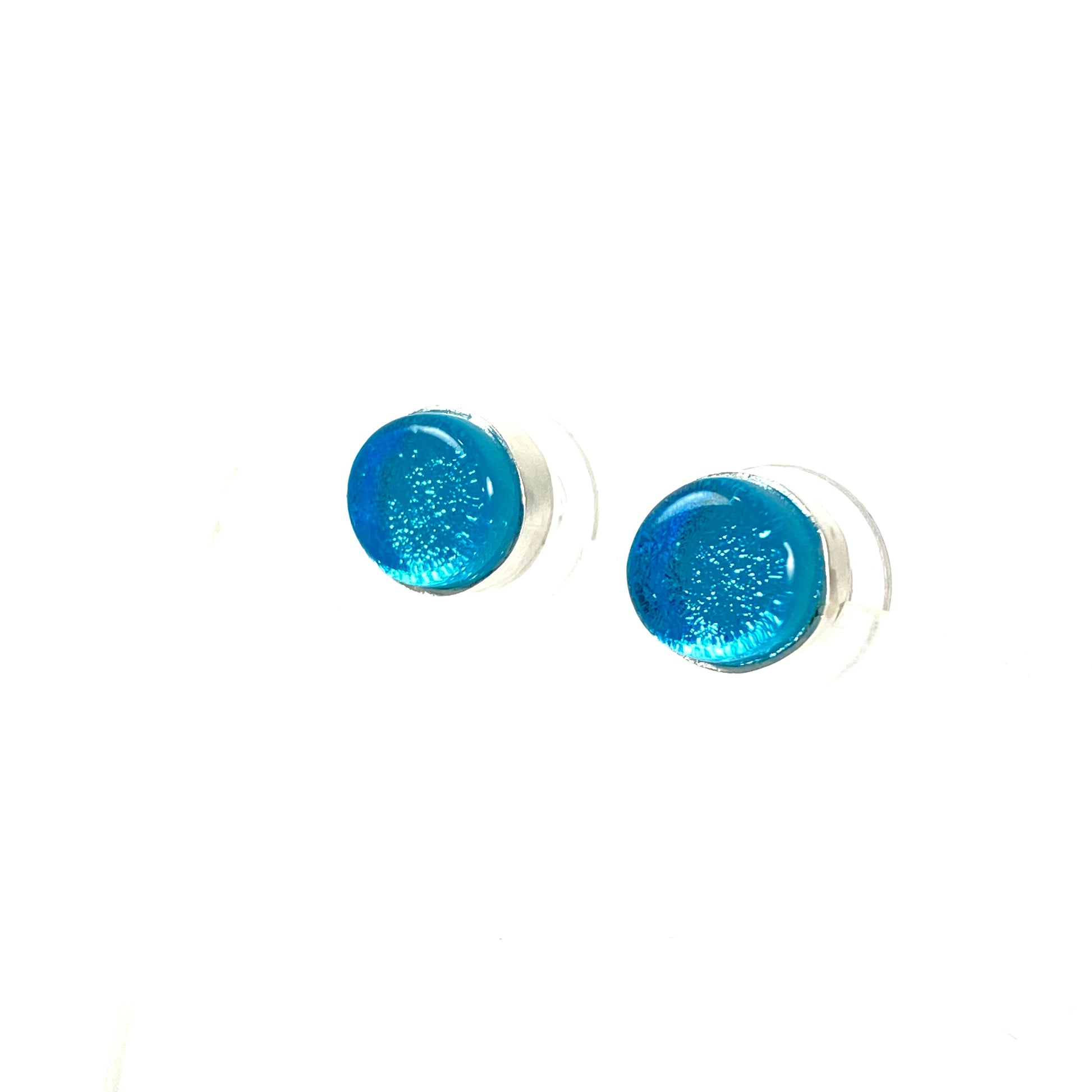 Circle post earrings in silver blue glass, fused glass, glass jewelry, glass and silver jewelry, handmade, handcrafted, American Craft, hand fabricated jewelry, hand fabricated jewellery, Athen, Georgia, colorful jewelry, sparkle, bullseye glass, dichroic glass, art jewelry