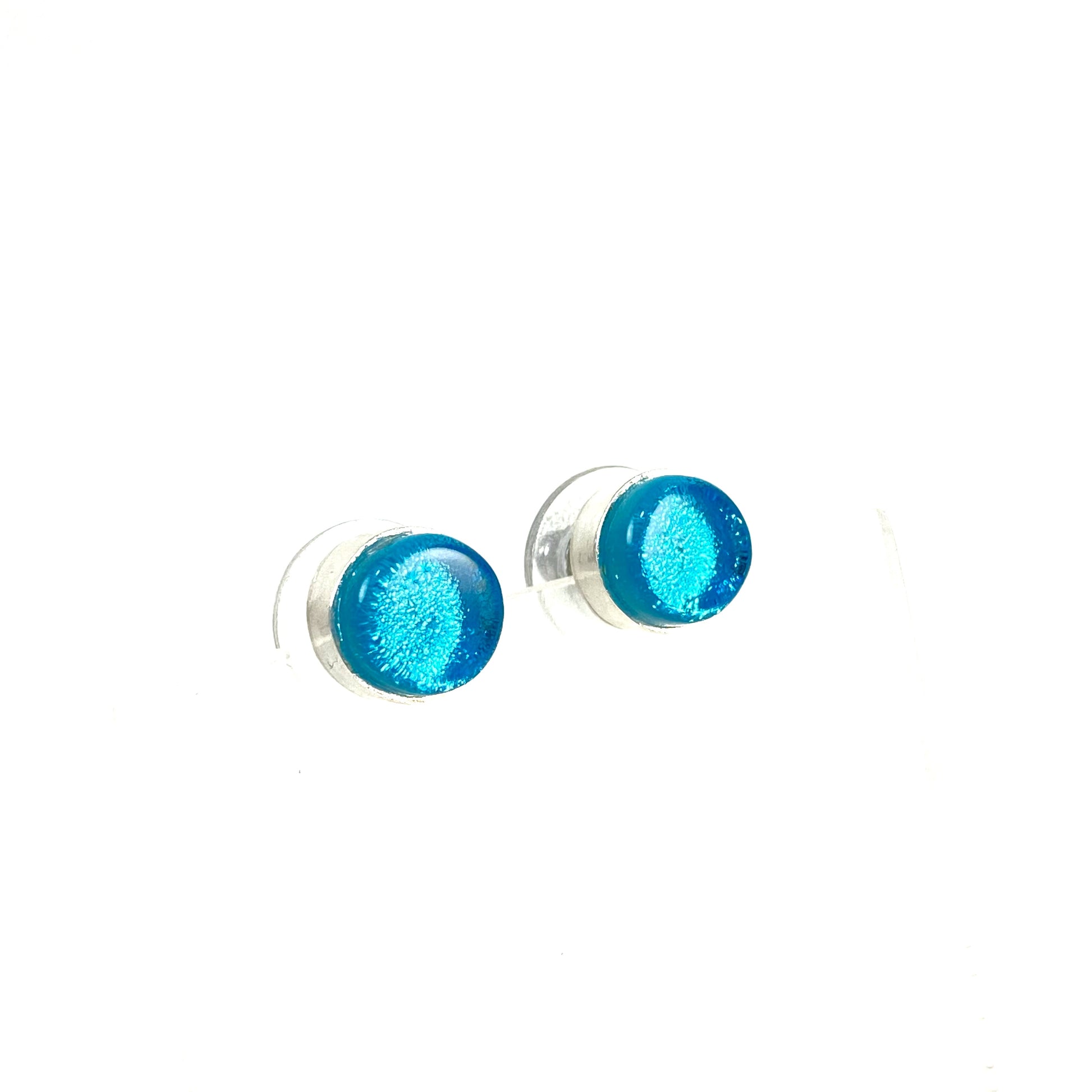 Circle post earrings in silver blue glass, fused glass, glass jewelry, glass and silver jewelry, handmade, handcrafted, American Craft, hand fabricated jewelry, hand fabricated jewellery, Athen, Georgia, colorful jewelry, sparkle, bullseye glass, dichroic glass, art jewelry