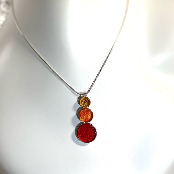 triple circle drop necklace, yellow, orange, red, fused glass, glass jewelry, glass and silver jewelry, handmade, handcrafted, American Craft, hand fabricated jewelry, hand fabricated jewellery, Athen, Georgia, colorful jewelry, sparkle, bullseye glass, dichroic glass, art jewelry