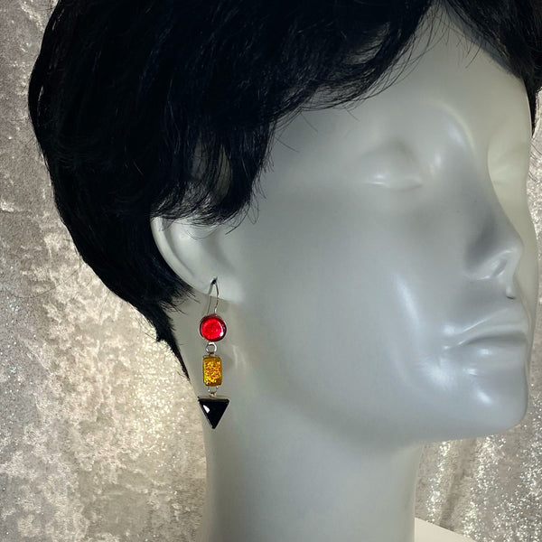 red, yellow, black, triple drop earrings, fused glass, glass jewelry, glass and silver jewelry, handmade, handcrafted, American Craft, hand fabricated jewelry, hand fabricated jewellery, Athen, Georgia, colorful jewelry, sparkle, bullseye glass, dichroic glass, art jewelry