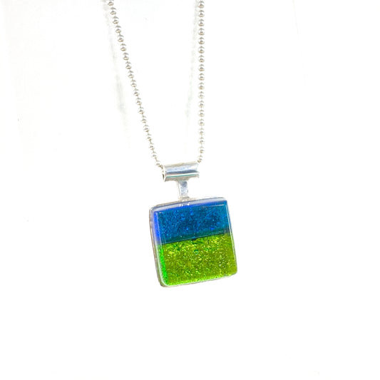 two tone, square glass necklace, blue, green, fused glass, glass jewelry, glass and silver jewelry, handmade, handcrafted, American Craft, hand fabricated jewelry, hand fabricated jewellery, Athen, Georgia, colorful jewelry, sparkle, bullseye glass, dichroic glass, art jewelry
